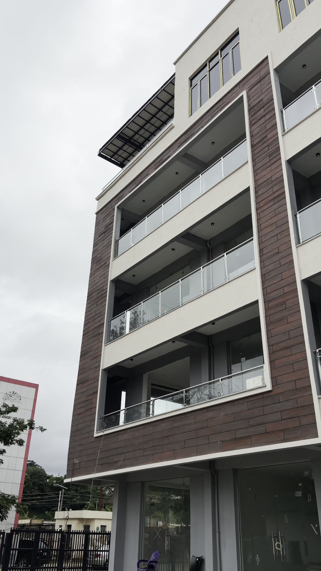 Modern commercial building with a brown and white facade in Wuse II, Abuja