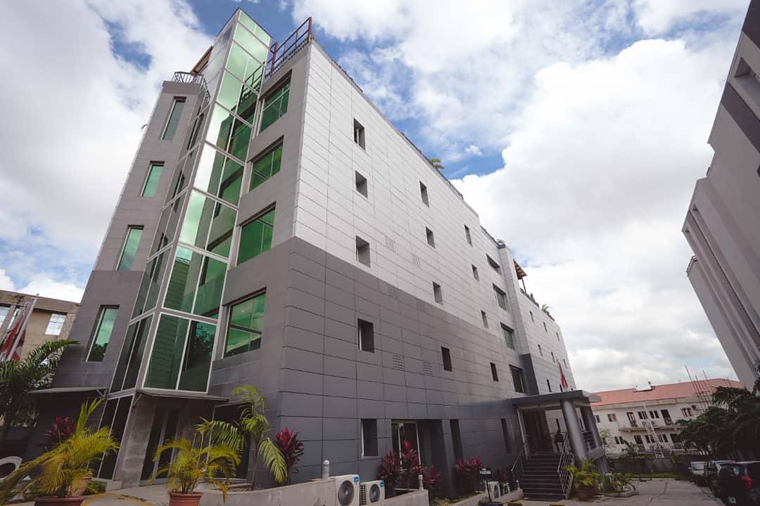Six storey grey and glass hotel building in Wuse Zone 4, Abuja